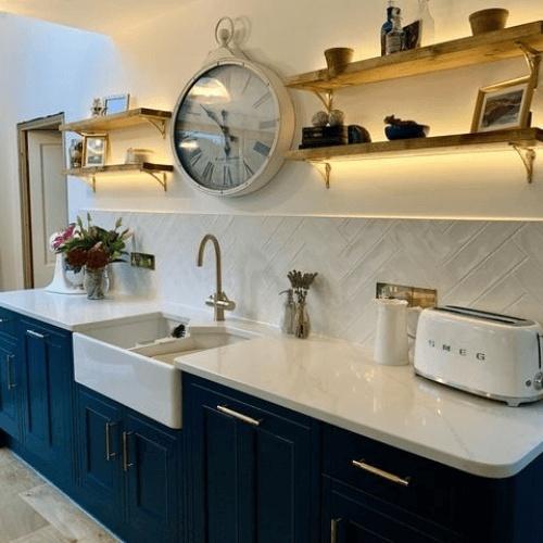 Blue Kitchen with Satin Brass Cupboard Handles at More Handles. Image credit - @littlegreyswan