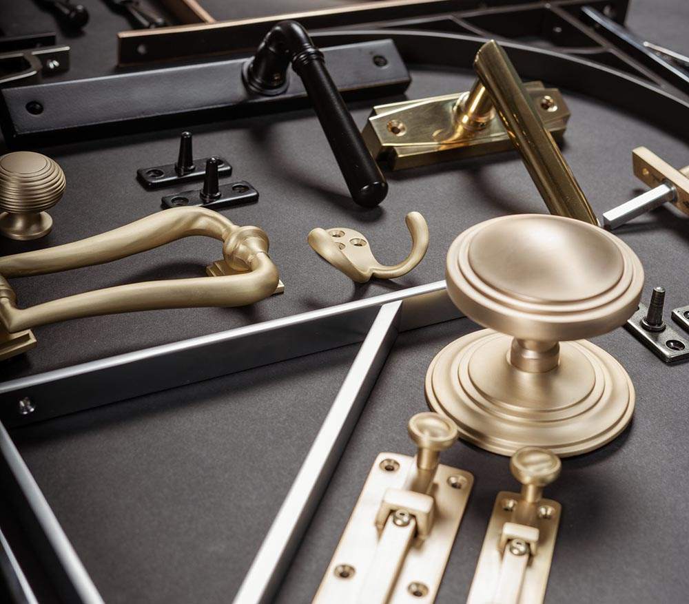 A collection of Satin Brass Hardware by From the Anvil at More Handles