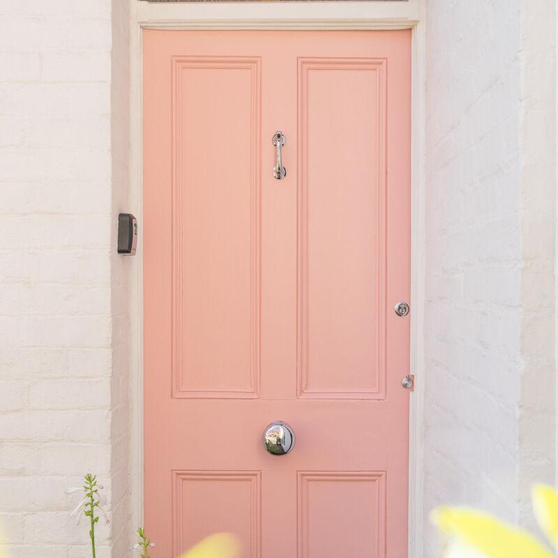 Carlisle Brass Pink Front door with polished chrome hardware